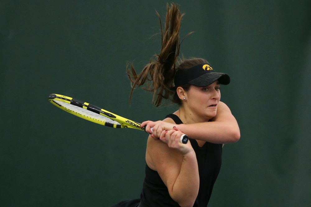 Iowa’s Danielle Bauers returns a hit during the Iowa women’s tennis meet vs UNI  on Saturday, February 29, 2020 at the Hawkeye Tennis and Recreation Complex. (Lily Smith/hawkeyesports.com)