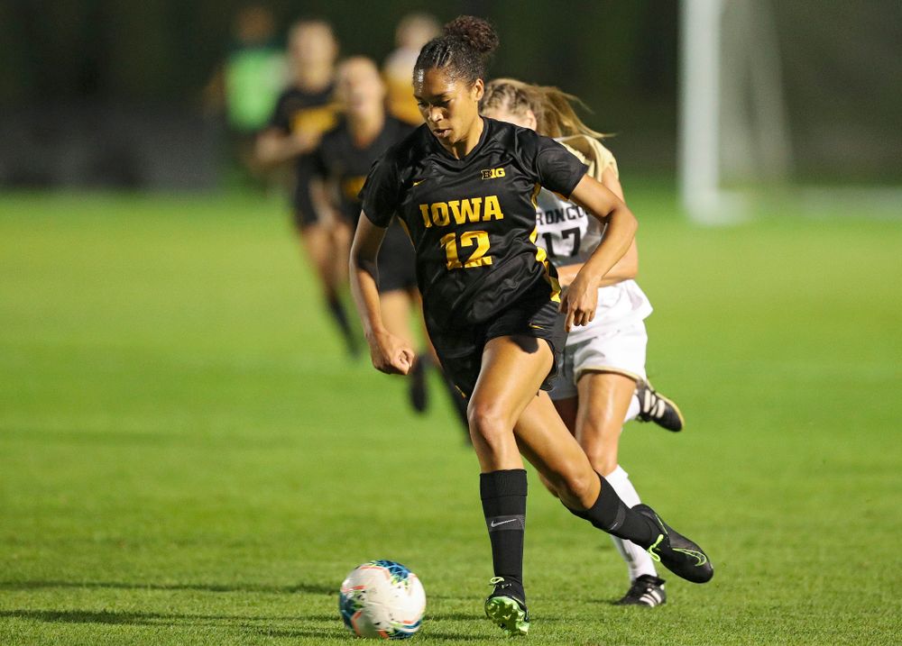 Iowa forward Olivia Fiegel (12) moves with the ball during the second half of their match against Western Michigan at the Iowa Soccer Complex in Iowa City on Thursday, Aug 22, 2019. (Stephen Mally/hawkeyesports.com)