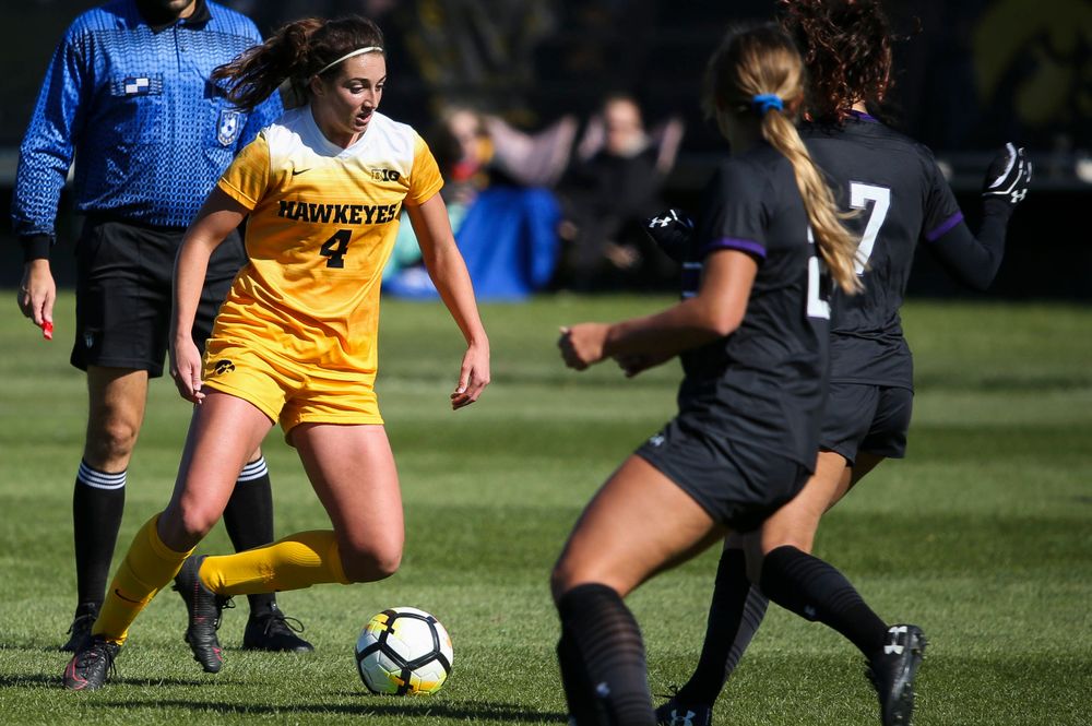 Iowa Hawkeyes forward Kaleigh Haus (4) dribbles the ball during a game against Northwestern at the Iowa Soccer Complex on October 21, 2018. (Tork Mason/hawkeyesports.com)