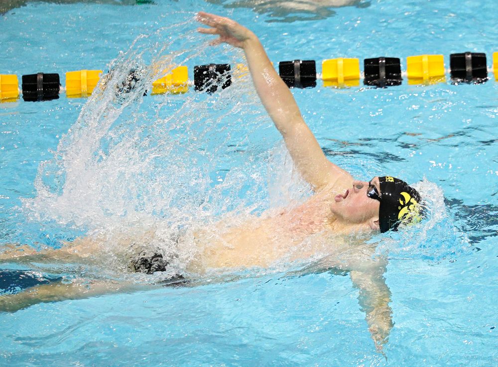Iowa’s John Colin swims the men’s 100-yard backstroke event during their meet against Michigan State and Northern Iowa at the Campus Recreation and Wellness Center in Iowa City on Friday, Oct 4, 2019. (Stephen Mally/hawkeyesports.com)