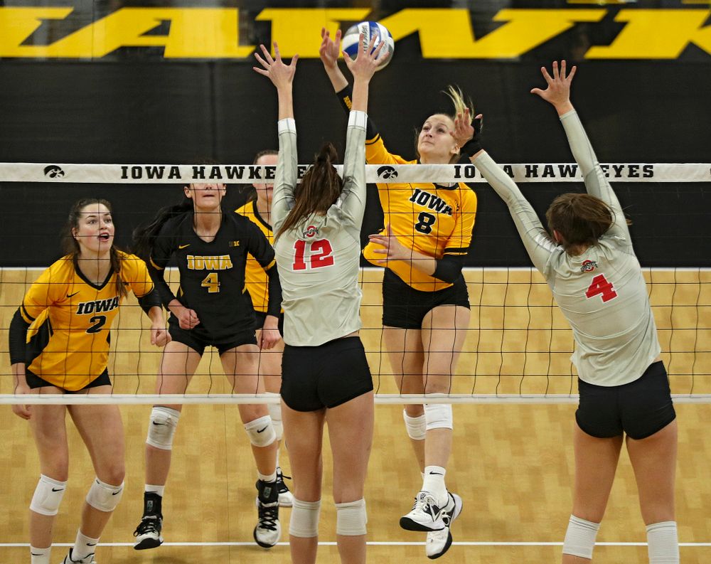 Iowa’s Kyndra Hansen (8) lines up a kill during the second set of their match at Carver-Hawkeye Arena in Iowa City on Friday, Nov 29, 2019. (Stephen Mally/hawkeyesports.com)
