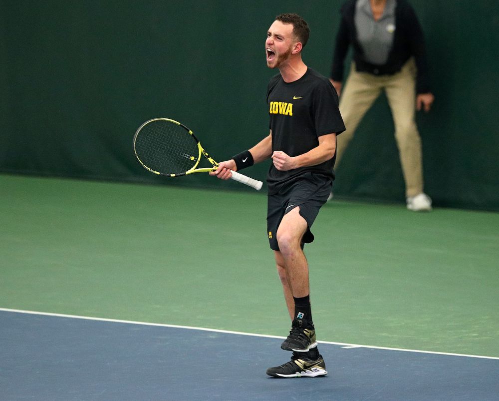 Iowa’s Kareem Allaf celebrates a point during his doubles match at the Hawkeye Tennis and Recreation Complex in Iowa City on Friday, March 6, 2020. (Stephen Mally/hawkeyesports.com)