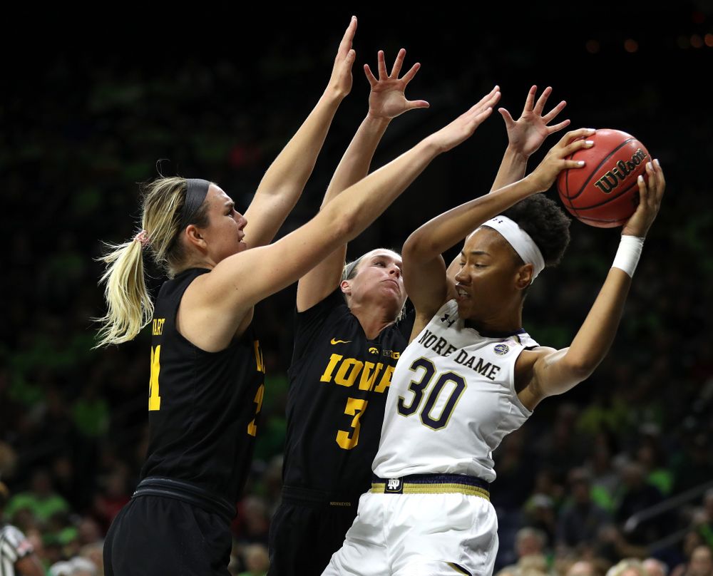 Iowa Hawkeyes forward Hannah Stewart (21) and guard Makenzie Meyer (3) against the Notre Dame Fighting Irish Thursday, November 29, 2018 at the Joyce Center in South Bend, Ind. (Brian Ray/hawkeyesports.com)