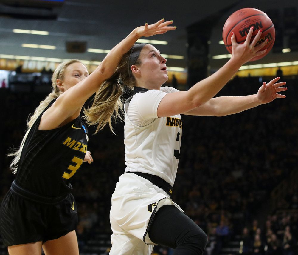 Iowa Hawkeyes guard Makenzie Meyer (3) scores a basket during the second quarter of their second round game in the 2019 NCAA Women's Basketball Tournament at Carver Hawkeye Arena in Iowa City on Sunday, Mar. 24, 2019. (Stephen Mally for hawkeyesports.com)