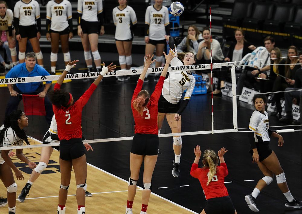 Iowa Hawkeyes outside hitter Meghan Buzzerio (5) spikes the ball during a match against Maryland at Carver-Hawkeye Arena on November 23, 2018. (Tork Mason/hawkeyesports.com)
