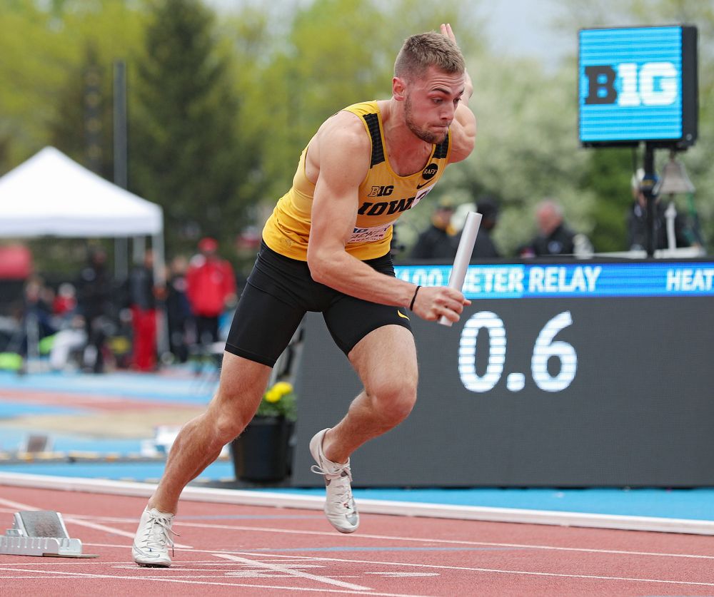 Iowa's Collin Hofacker runs his section of the men’s 400 meter relay event on the third day of the Big Ten Outdoor Track and Field Championships at Francis X. Cretzmeyer Track in Iowa City on Sunday, May. 12, 2019. (Stephen Mally/hawkeyesports.com)