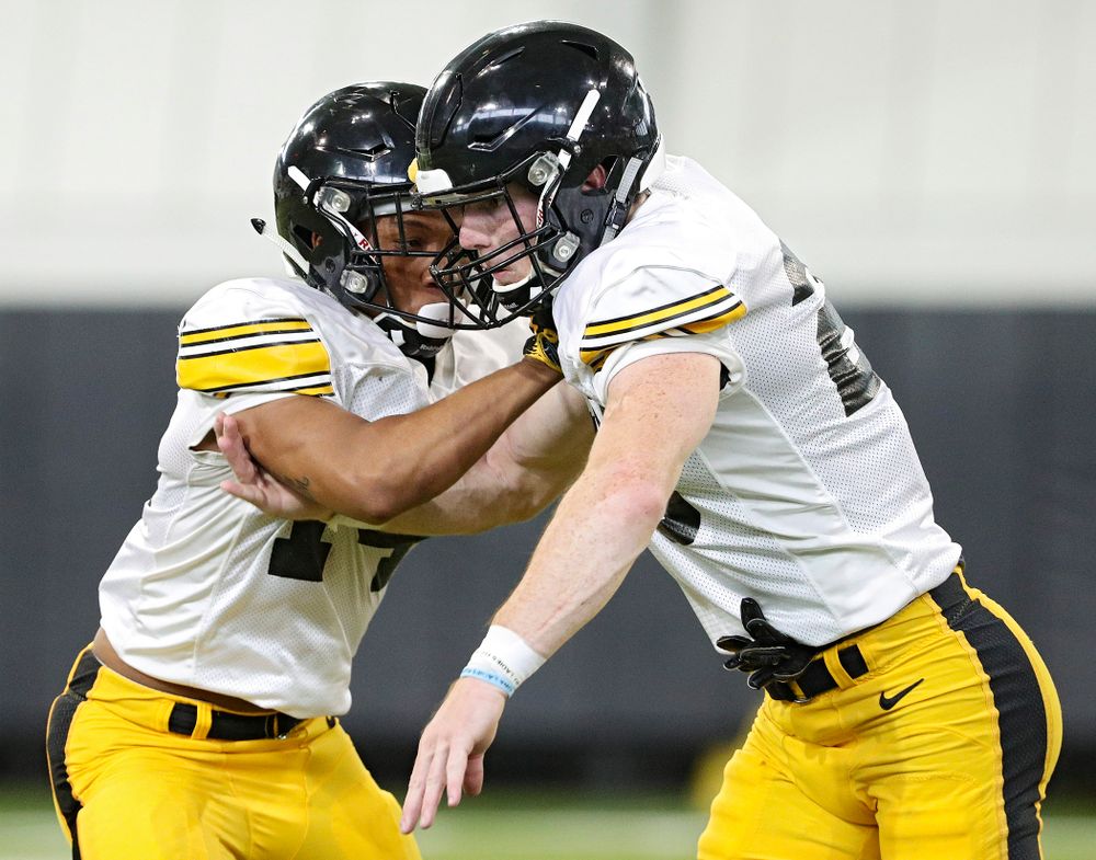 Iowa Hawkeyes defensive back Daraun McKinney (from left) and defensive back Jack Koerner work on a drill during Fall Camp Practice No. 6 at the Hansen Football Performance Center in Iowa City on Thursday, Aug 8, 2019. (Stephen Mally/hawkeyesports.com)