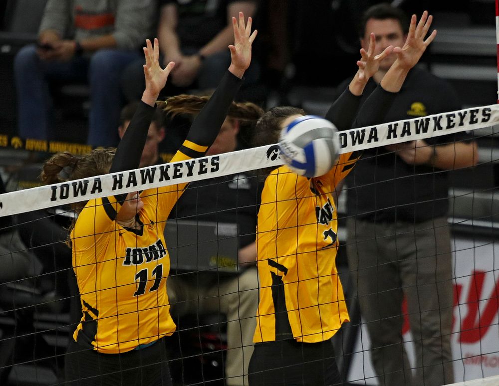 Iowa’s Blythe Rients (11) blocks a shot during their match at Carver-Hawkeye Arena in Iowa City on Sunday, Oct 20, 2019. (Stephen Mally/hawkeyesports.com)