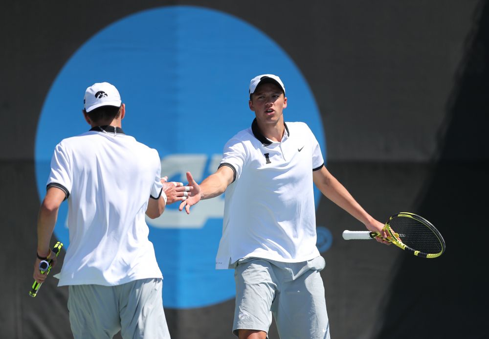 IowaÕs Joe Tyler and Nikita Snezhko play a doubles match against the Michigan Wolverines Sunday, April 21, 2019 at the Hawkeye Tennis and Recreation Complex. (Brian Ray/hawkeyesports.com)