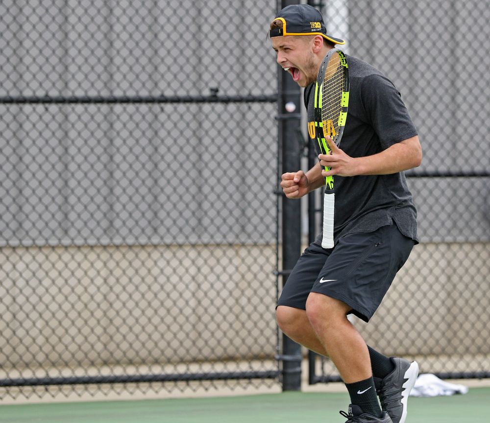Iowa's Will Davies celebrates as he competes during a match against Ohio State at the Hawkeye Tennis and Recreation Complex in Iowa City on Sunday, Apr. 7, 2019. (Stephen Mally/hawkeyesports.com)