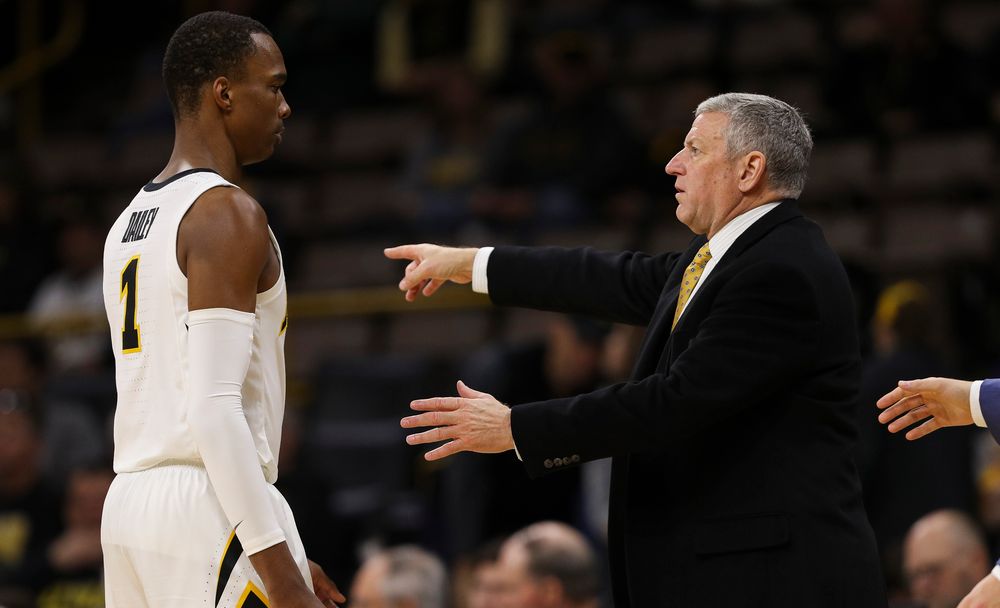 Iowa Hawkeyes assistant coach Kirk Speraw gives instructions to Iowa Hawkeyes guard Maishe Dailey (1) during a dead ball situation during a game against Guilford College at Carver-Hawkeye Arena on November 4, 2018. (Tork Mason/hawkeyesports.com)