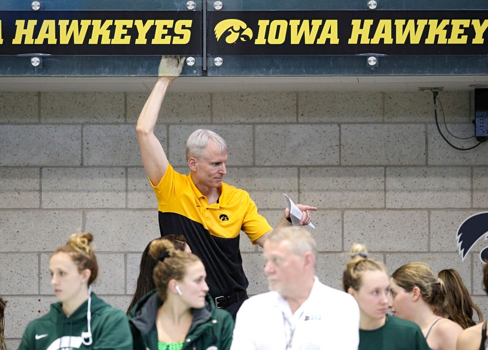 Iowa head coach Marc Long talks with his team during the 2020 Women’s Big Ten Swimming and Diving Championships at the Campus Recreation and Wellness Center in Iowa City on Thursday, February 20, 2020. (Stephen Mally/hawkeyesports.com)