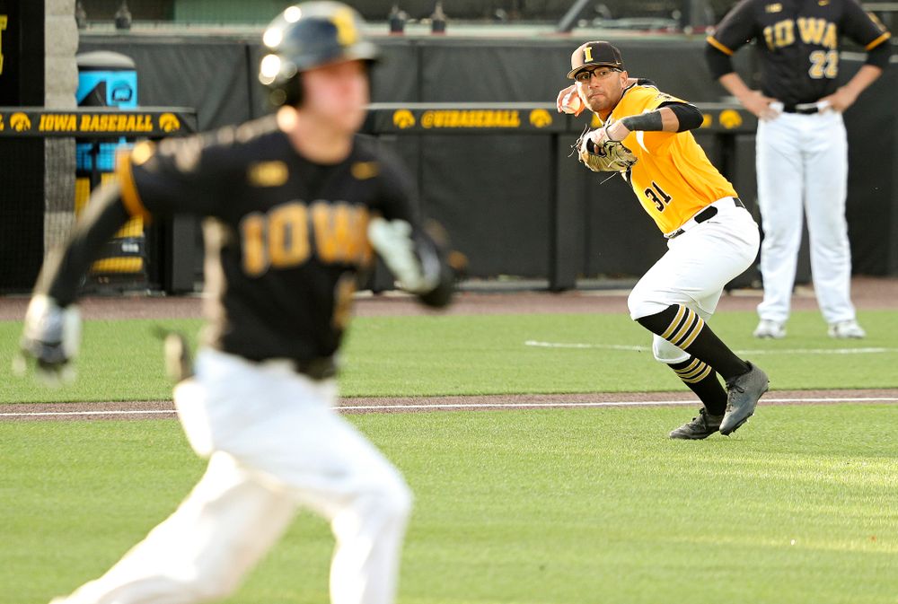 Iowa infielder Matthew Sosa (31) throws to first after fielding a bunt during the fifth inning of the first game of the Black and Gold Fall World Series at Duane Banks Field in Iowa City on Tuesday, Oct 15, 2019. (Stephen Mally/hawkeyesports.com)