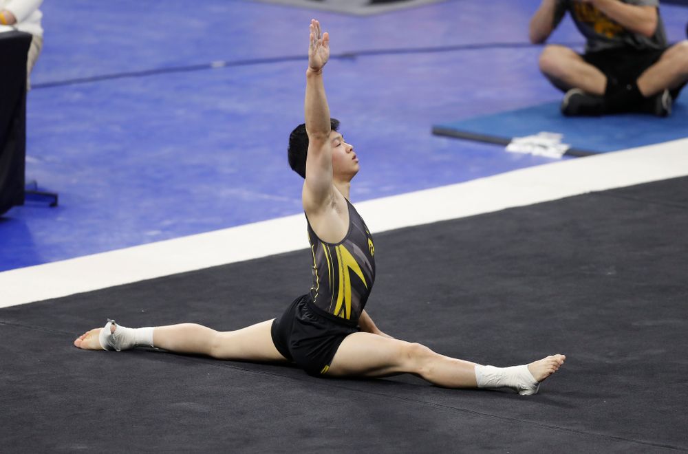 Iowa's Bennet Huang competes on the floor 