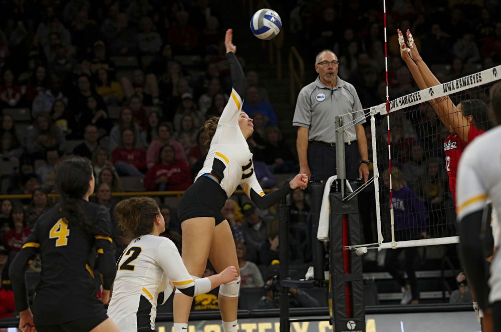 Iowa’s Blythe Rients (11) goes up for a shot during the third set of their match against Nebraska at Carver-Hawkeye Arena in Iowa City on Saturday, Nov 9, 2019. (Stephen Mally/hawkeyesports.com)