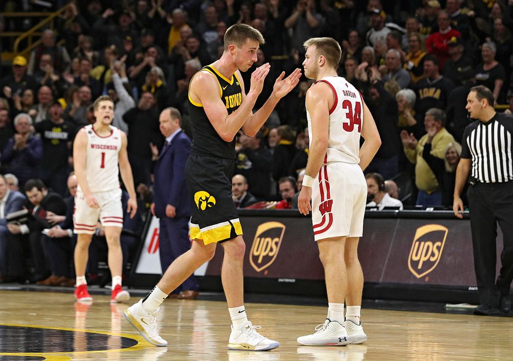 Iowa Hawkeyes guard Joe Wieskamp (10) claps as he walks back to the bench for a timeout during the second half of their game at Carver-Hawkeye Arena in Iowa City on Monday, January 27, 2020. (Stephen Mally/hawkeyesports.com)