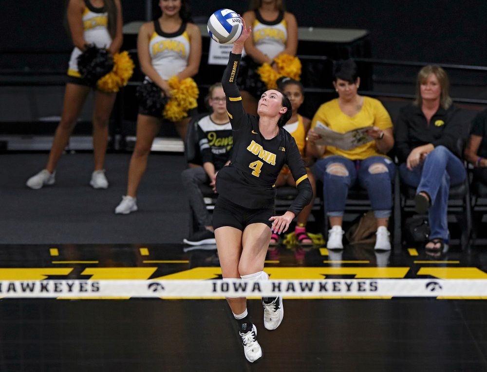 Iowa’s Halle Johnston (4) serves during the first set of their Big Ten/Pac-12 Challenge match against Colorado at Carver-Hawkeye Arena in Iowa City on Friday, Sep 6, 2019. (Stephen Mally/hawkeyesports.com)
