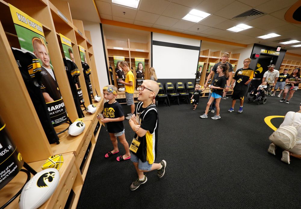 The Kid Captains check out their lockers during Kids Day Saturday, August 11, 2018 at Kinnick Stadium. (Brian Ray/hawkeyesports.com)