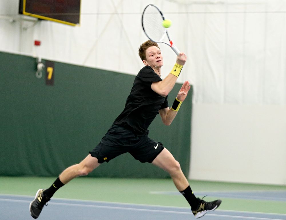 Iowa’s Jason Kerst returns a shot during their match at the Hawkeye Tennis and Recreation Complex in Iowa City on Thursday, January 16, 2020. (Stephen Mally/hawkeyesports.com)