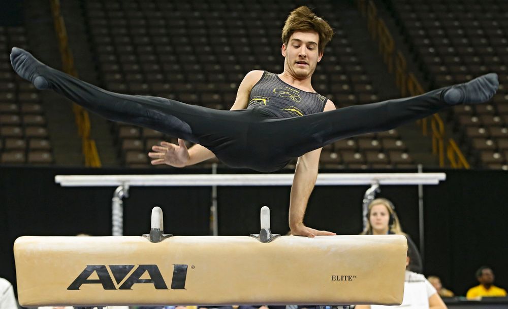 Iowa's Kevin Johnson competes in the pommel horse against Ohio State at Caver-Hawkeye Arena in Iowa City on Saturday, Mar. 16, 2019. (Stephen Mally for HawkeyeSports.com)