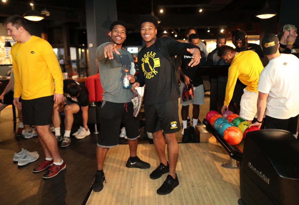 Iowa Hawkeyes wide receiver Tyrone Tracy Jr. (3) and defensive back Kaevon Merriweather (26) during the Players' Night at Splitsville Friday, December 28, 2018 in the Sparkman Wharf area of Tampa, FL.(Brian Ray/hawkeyesports.com)