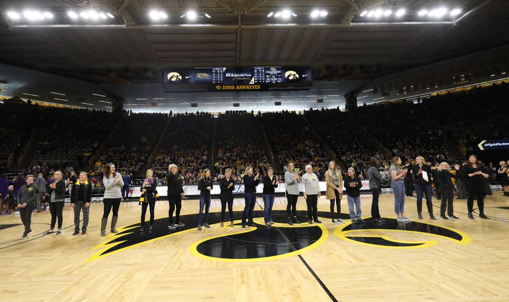 Former players are introduced during the Iowa Hawkeyes game against the Northwestern Wildcats Sunday, March 3, 2019 at Carver-Hawkeye Arena. (Brian Ray/hawkeyesports.com)