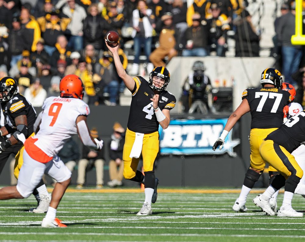 Iowa Hawkeyes quarterback Nate Stanley (4) throws a pass during the first quarter of their game at Kinnick Stadium in Iowa City on Saturday, Nov 23, 2019. (Stephen Mally/hawkeyesports.com)
