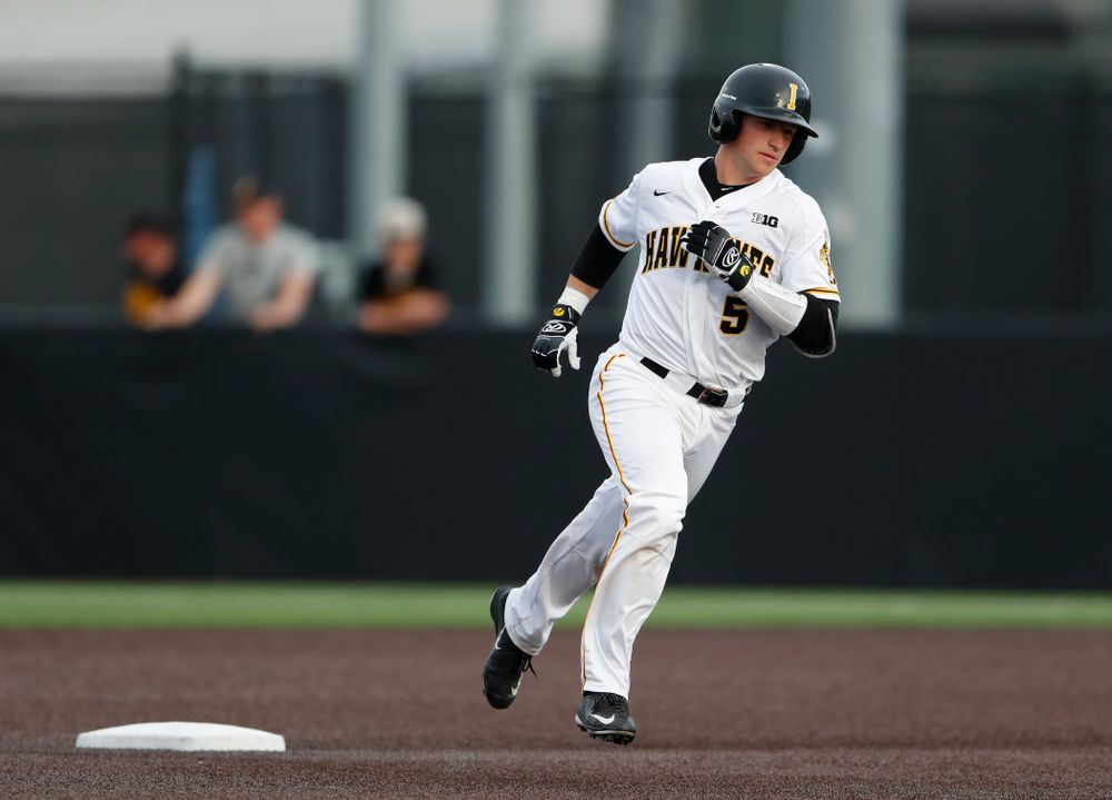 Iowa Hawkeyes catcher Tyler Cropley (5) hits a home run against the Missouri Tigers Tuesday, May 1, 2018 at Duane Banks Field. (Brian Ray/hawkeyesports.com)