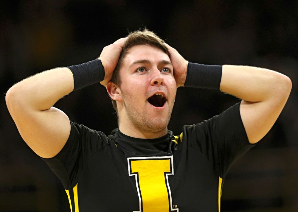 An Iowa Spirit Squad member reacts after throwing a t-shirt during the second half of their their game at Carver-Hawkeye Arena in Iowa City on Sunday, December 29, 2019. (Stephen Mally/hawkeyesports.com)