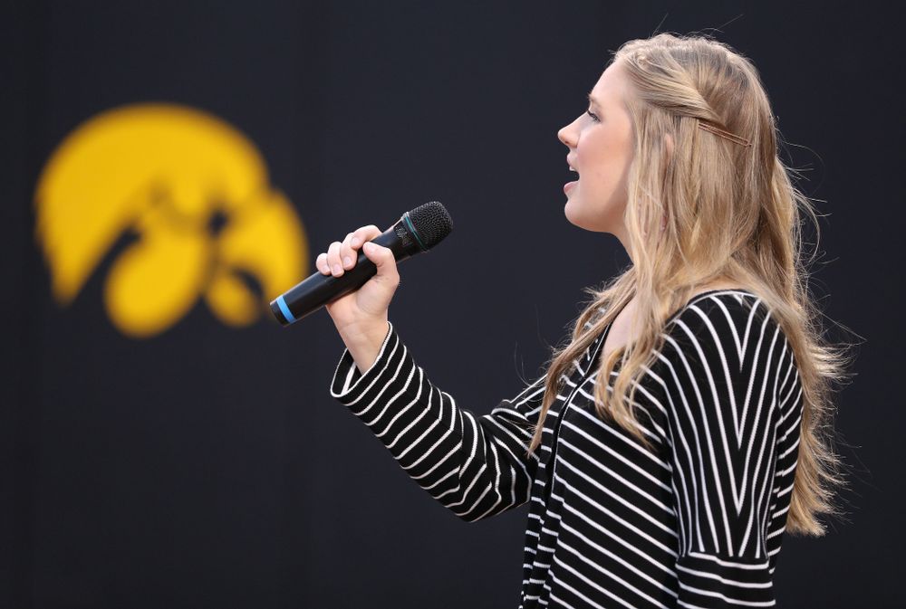 Emma Bluder sings the National Anthem before the Iowa Hawkeyes game against Western Illinois Wednesday, March 27, 2019 at Pearl Field. (Brian Ray/hawkeyesports.com)