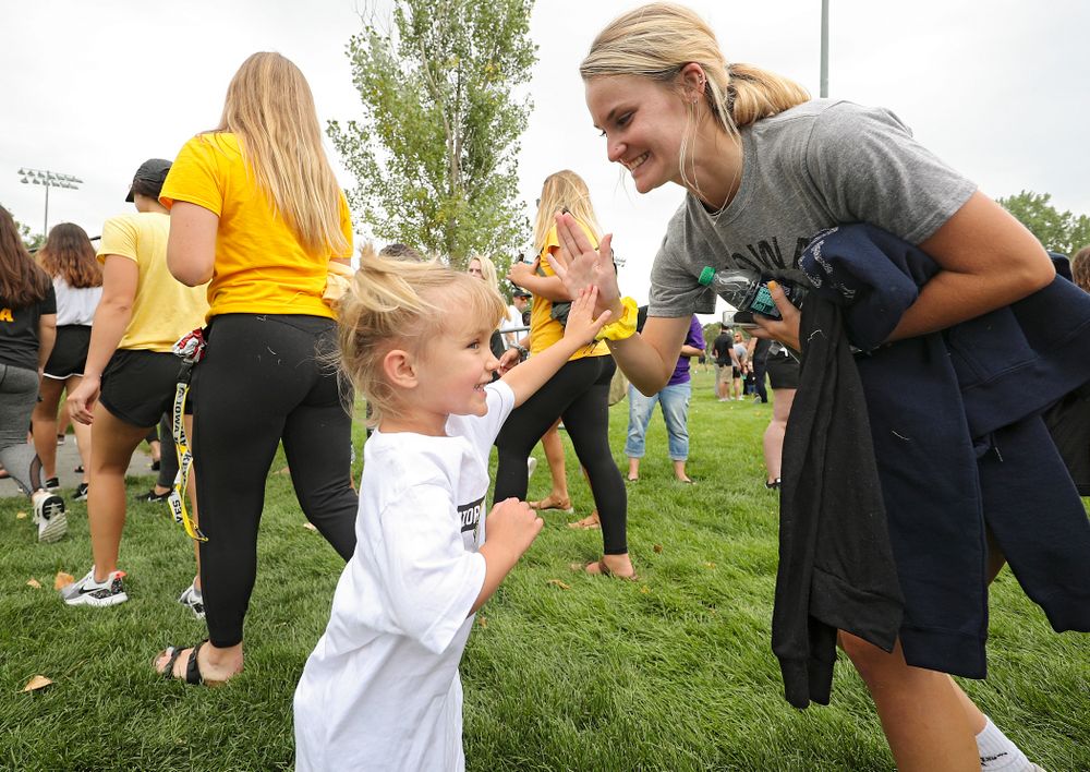 A young fan greets student-athletes in the Parade of Champions during the Student-Athlete Kickoff at the Iowa Soccer Complex in Iowa City on Sunday, Aug 25, 2019. (Stephen Mally/hawkeyesports.com)