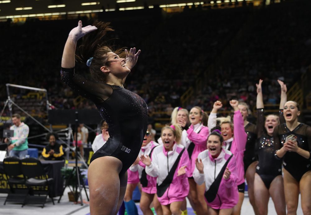 Iowa’s Erin Castle competes on the beam against Michigan Friday, February 14, 2020 at Carver-Hawkeye Arena. (Brian Ray/hawkeyesports.com)