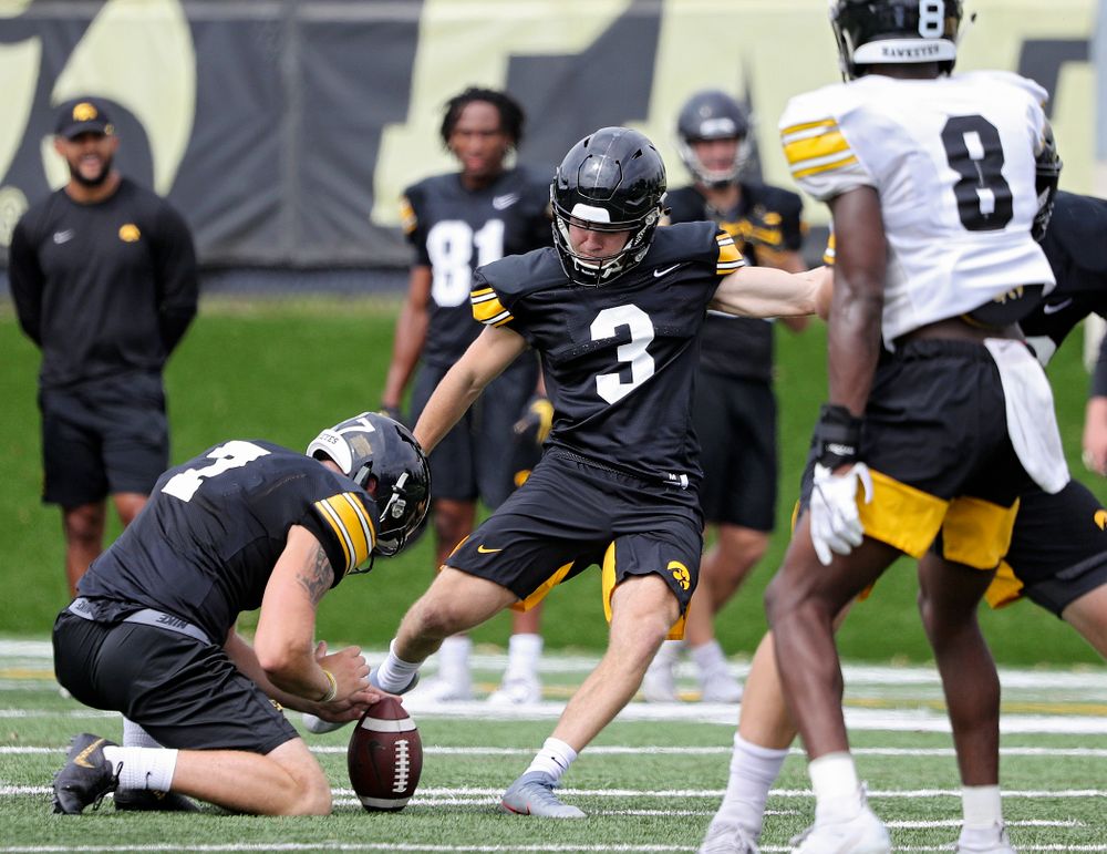 Iowa Hawkeyes place kicker Keith Duncan (3) makes a field goal from the hold of Colten Rastetter (7) during Fall Camp Practice No. 15 at the Hansen Football Performance Center in Iowa City on Monday, Aug 19, 2019. (Stephen Mally/hawkeyesports.com)