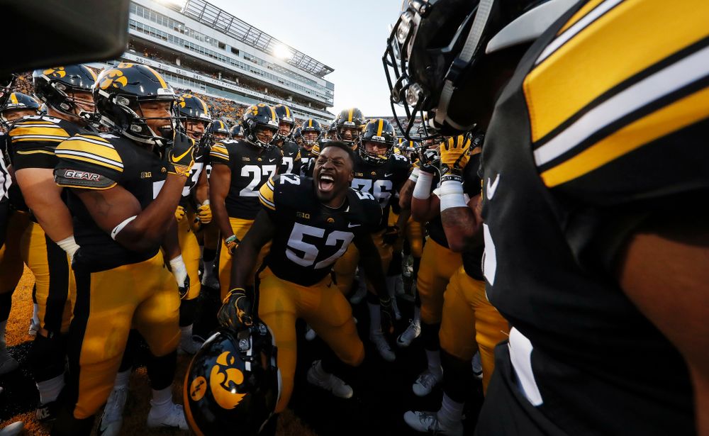 Iowa Hawkeyes linebacker Amani Jones (52) pumps up his teammates before their game against the Wisconsin Badgers Saturday, September 22, 2018 at Kinnick Stadium. (Brian Ray/hawkeyesports.com)