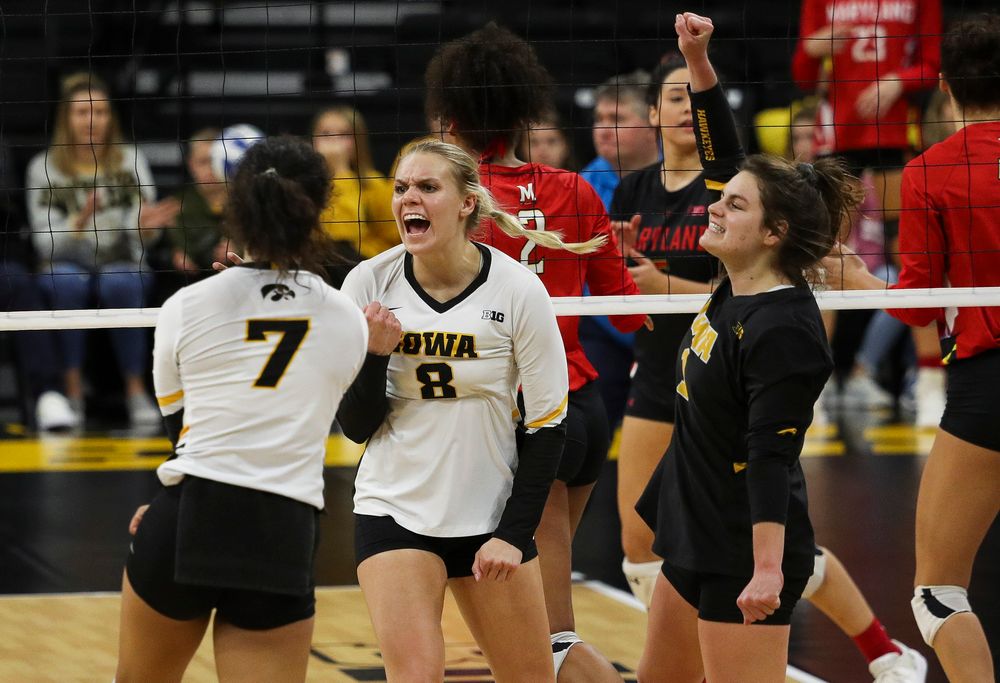 Iowa Hawkeyes right side hitter Reghan Coyle (8) celebrates after winning a point during a match against Maryland at Carver-Hawkeye Arena on November 23, 2018. (Tork Mason/hawkeyesports.com)