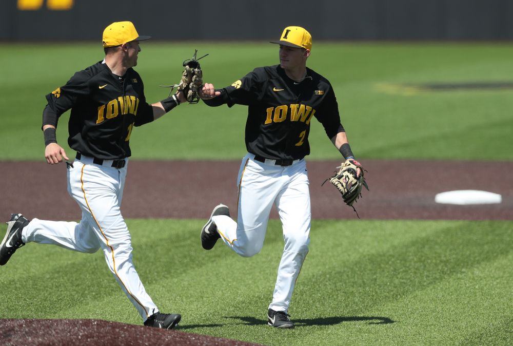 Iowa Hawkeyes Tanner Wetrich (16) and infielder Brendan Sher (2) during game two against UC Irvine Saturday, May 4, 2019 at Duane Banks Field. (Brian Ray/hawkeyesports.com)