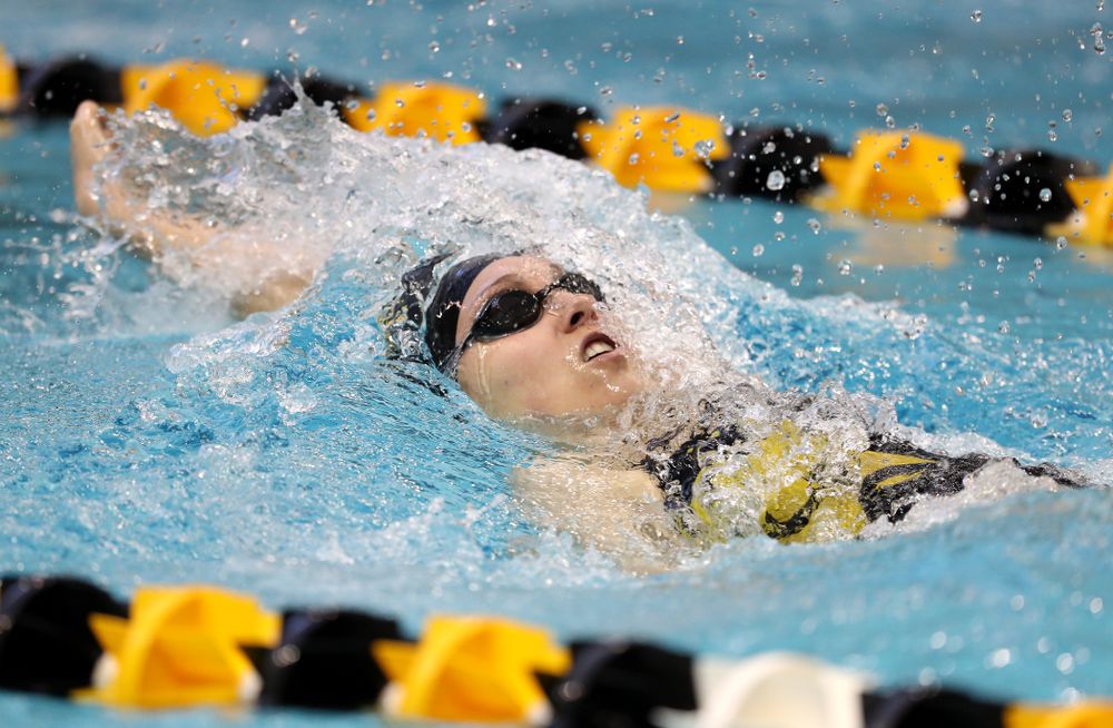 Iowa's Samantha Sauer swims the 100 yard backstroke during a double dual against Wisconsin and Northwestern Saturday, January 19, 2019 at the Campus Recreation and Wellness Center. (Brian Ray/hawkeyesports.com)
