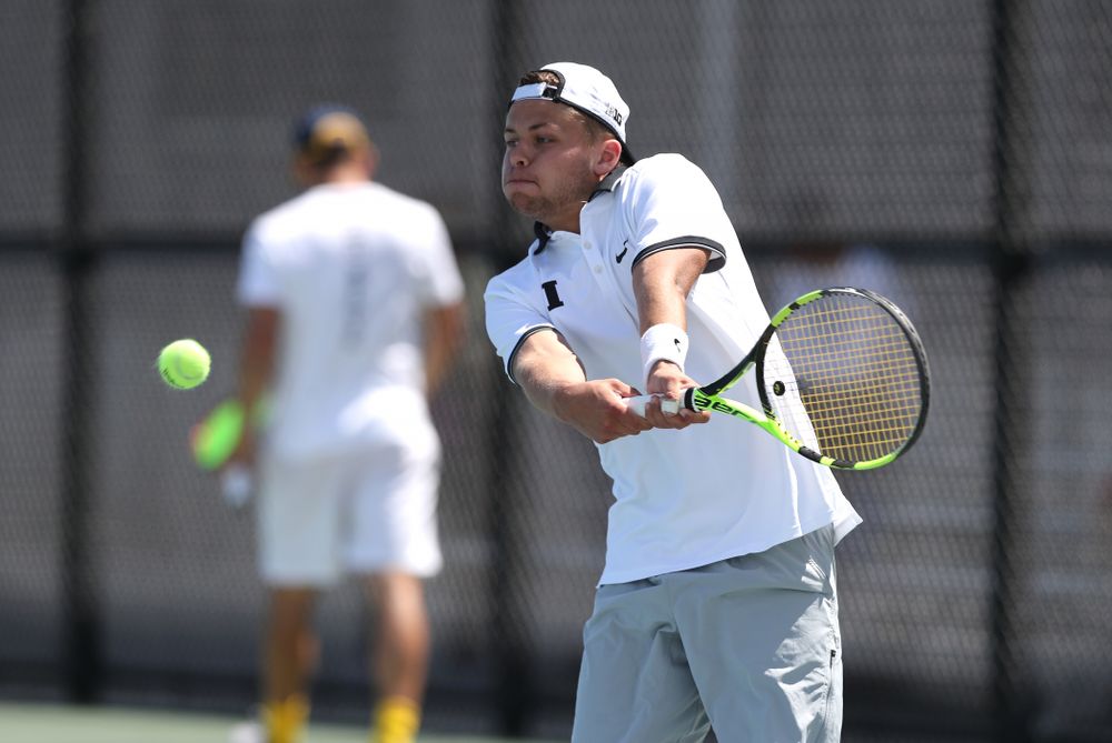 IowaÕs Will Davies against the Michigan Wolverines Sunday, April 21, 2019 at the Hawkeye Tennis and Recreation Complex. (Brian Ray/hawkeyesports.com)