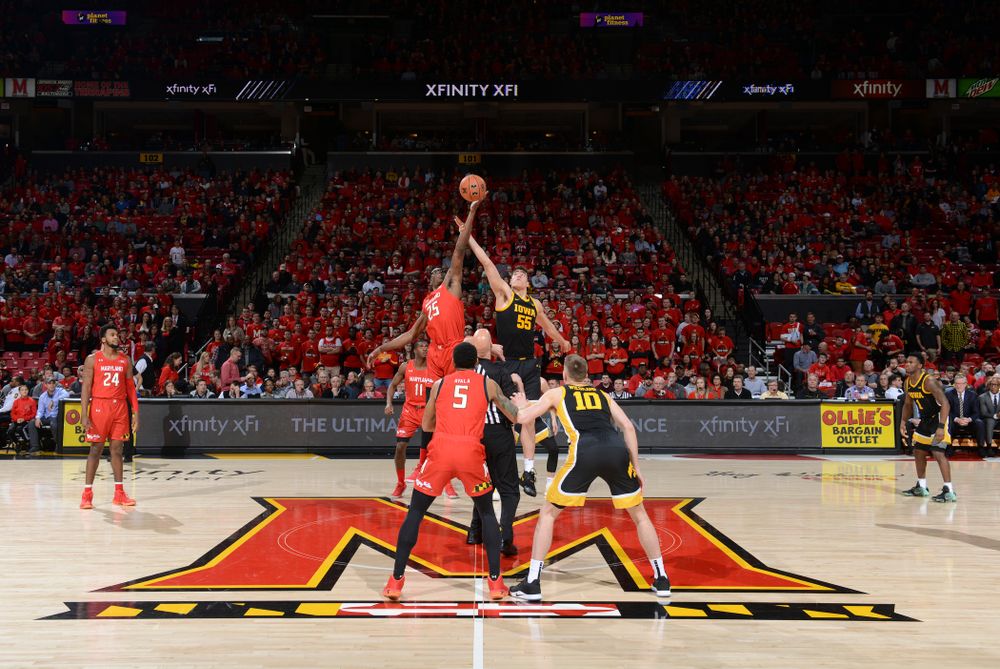 Iowa Hawkeyes center Luka Garza (55) battles for the opening tipoff during their game at the Xfinity Center in College Park, MD on Thursday, January 30, 2020. (University of Maryland Athletics)