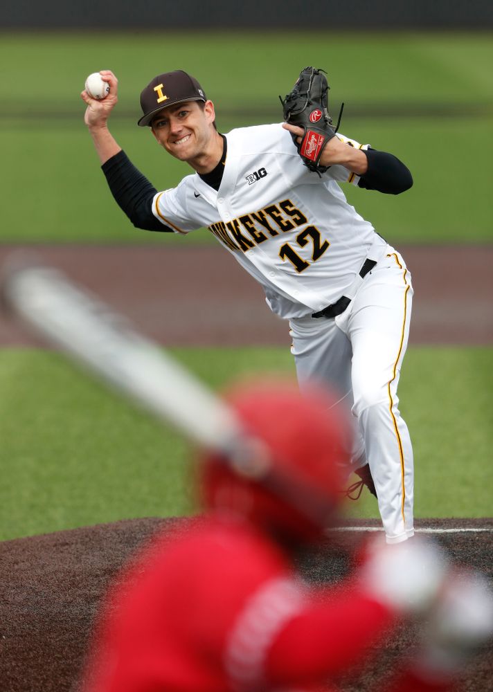 Iowa Hawkeyes pitcher Nick Nelsen (12) during a double header against the Indiana Hoosiers Friday, March 23, 2018 at Duane Banks Field. (Brian Ray/hawkeyesports.com)