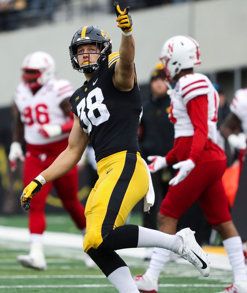 Iowa Hawkeyes tight end T.J. Hockenson (38) signals for a first down after making a reception during a game against Nebraska at Kinnick Stadium on November 23, 2018. (Tork Mason/hawkeyesports.com)