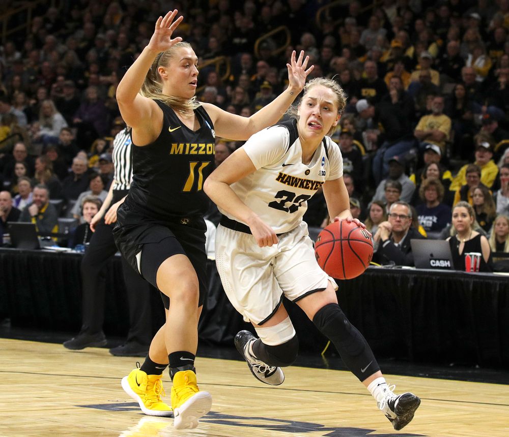 Iowa Hawkeyes guard Kathleen Doyle (22) drives with the ball during the second quarter of their second round game in the 2019 NCAA Women's Basketball Tournament at Carver Hawkeye Arena in Iowa City on Sunday, Mar. 24, 2019. (Stephen Mally for hawkeyesports.com)