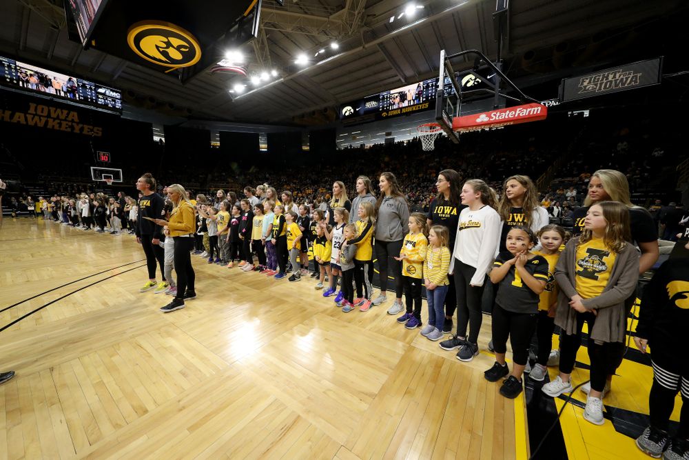 Female Athletes and participants in a youth clinic are recognized as part of National Girls and Women in Sports Day during the Iowa Hawkeyes game against Penn State Saturday, February 22, 2020 at Carver-Hawkeye Arena. (Brian Ray/hawkeyesports.com)
