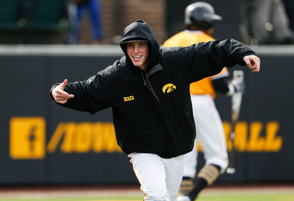 Iowa Hawkeyes pitcher Shane Ritter (18) reacts after the Hawkeyes take a 3-2 eighth inning lead during a game against Evansville at Duane Banks Field on March 18, 2018. (Tork Mason/hawkeyesports.com)