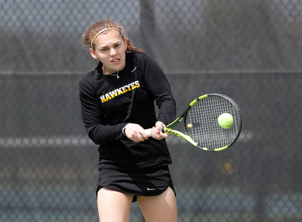Iowa's Zoe Douglas against the Wisconsin Badgers Sunday, April 22, 2018 at the Hawkeye Tennis and Recreation Center. (Brian Ray/hawkeyesports.com)