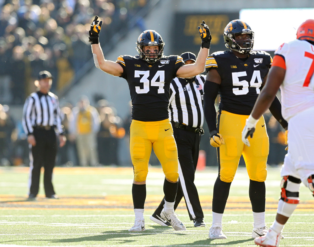 Iowa Hawkeyes linebacker Kristian Welch (34) pumps up the crowd during the fourth quarter of their game at Kinnick Stadium in Iowa City on Saturday, Nov 23, 2019. (Stephen Mally/hawkeyesports.com)