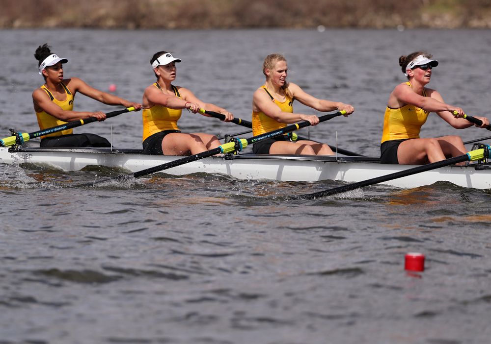 Iowa's Naomi Visser (from left), Elena Waiglein, Paige Schlapkohl, and Hannah Greenlee during their 1 Varsity 8 race against Wisconsin in their Big Ten Double Dual Rowing Regatta at Lake Macbride in Solon on Saturday, Apr. 13, 2019. (Stephen Mally/hawkeyesports.com)