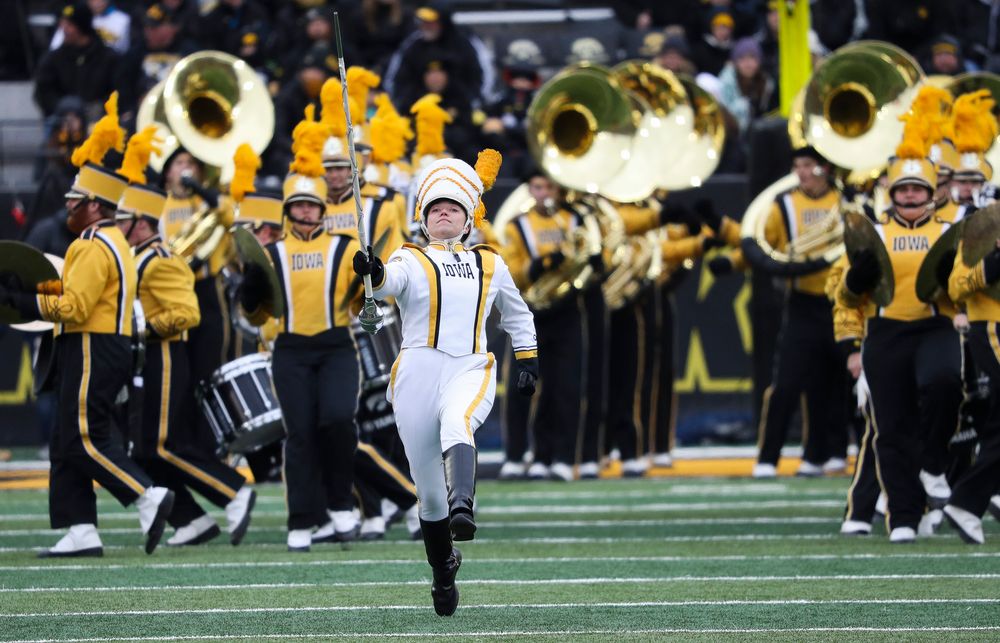Hawkeye Marching Band drum major Analisa Iole marches onto the field before a game against Northwestern at Kinnick Stadium on November 10, 2018. (Tork Mason/hawkeyesports.com)