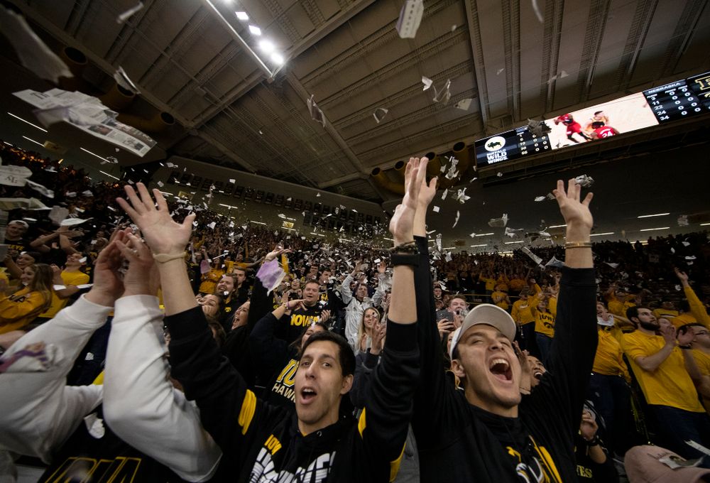 The Hawks Nest throws paper in the air after the Iowa Hawkeyes first basket against the Nebraska Cornhuskers Saturday, February 8, 2020 at Carver-Hawkeye Arena. (Brian Ray/hawkeyesports.com)