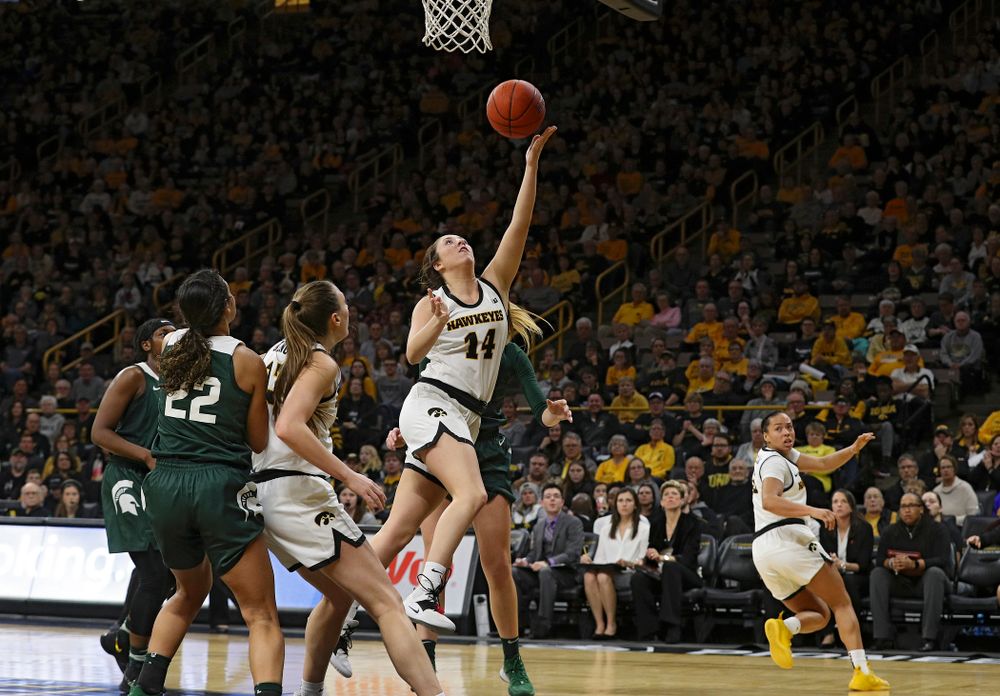Iowa Hawkeyes guard Gabbie Marshall (24) scores a basket during the third quarter of their game at Carver-Hawkeye Arena in Iowa City on Sunday, January 26, 2020. (Stephen Mally/hawkeyesports.com)